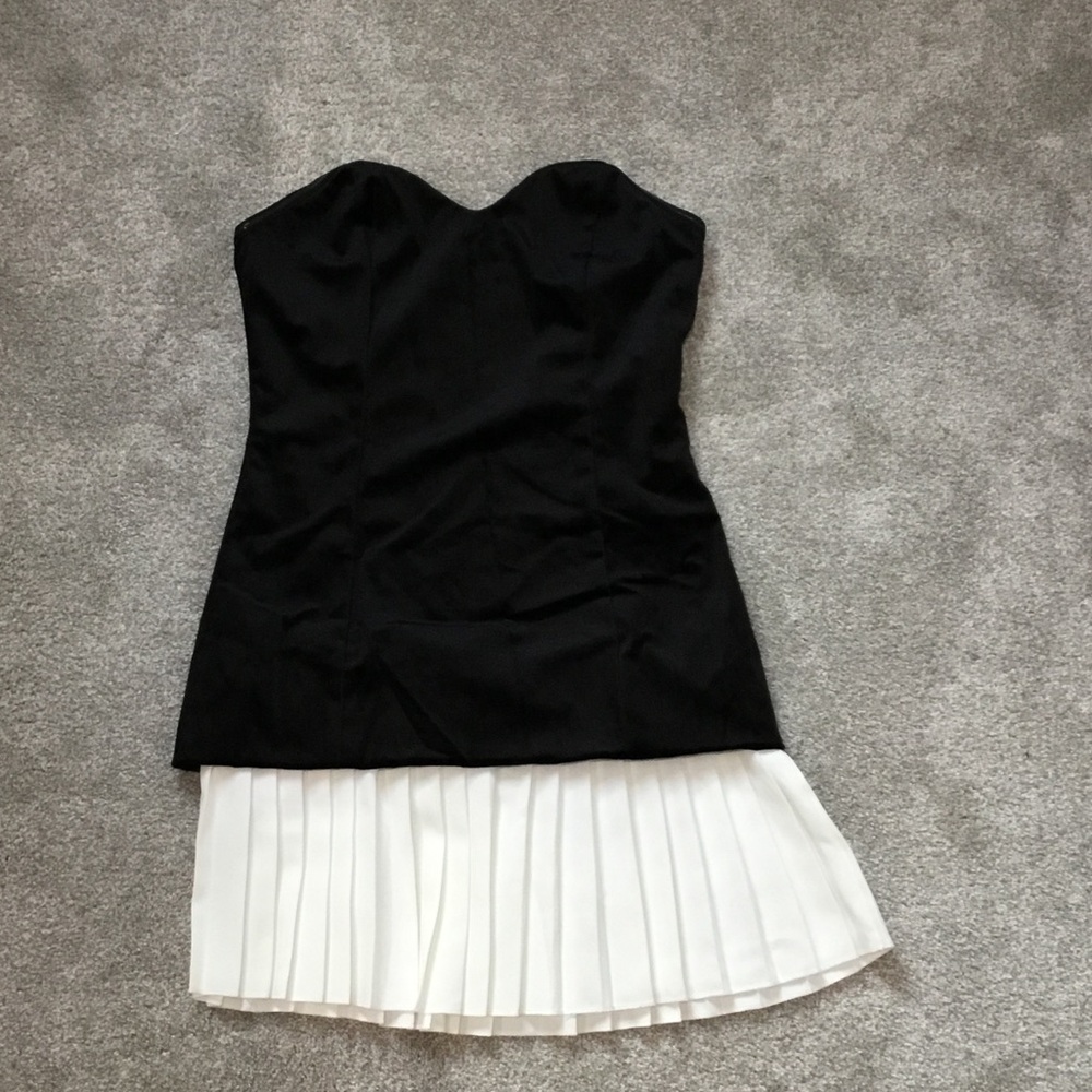 Elegant Strapless Black Dress with White Pleated Hem